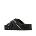 Stella McCartney Logo Cross-Strap Platform Slides — Black